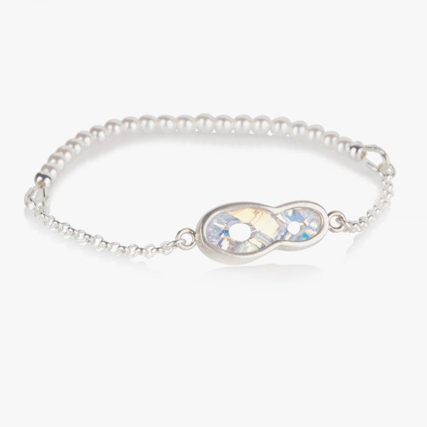 Beautiful handmade sterling silver bracelet with a white (Shiro) crystal and pearls on an elastic string. Easy to wear, due to the elastic string there isn’t a clasp needed. Put it on and ready to go, no struggle with a clasp and no help needed to put it on. If the bracelet turns on your wrist then the pearls show beautifully.