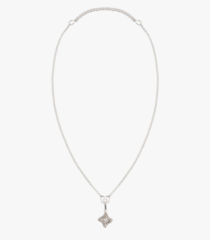 Beautiful handmade sterling silver necklace with a white (Shiro) crystal pendant, an Asian M hook clasp and pearl beads on an elastic string.
